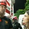 Colombia earthquake rescue volunteer reacts after pulling survivor from rubble