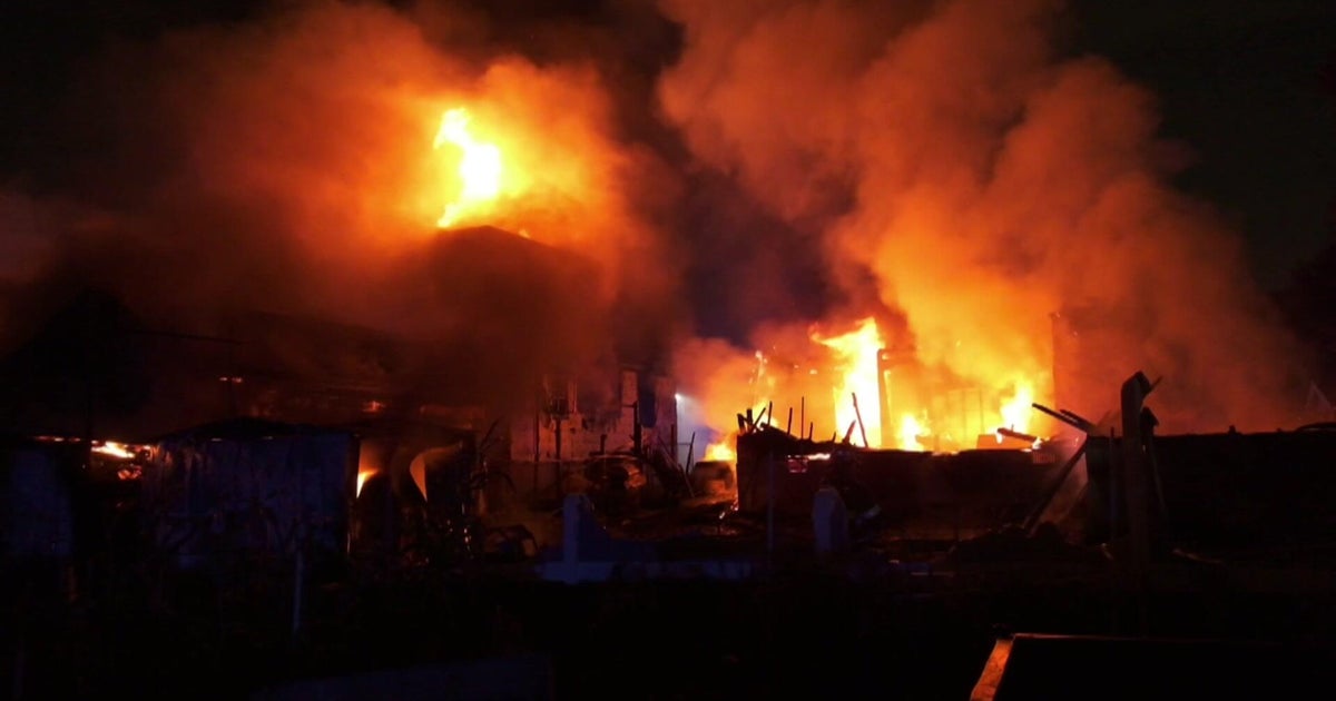 Firefighters battle large blaze engulfing two homes in Belleville, New Jersey