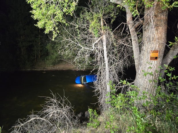 car-in-poudre-river.jpg