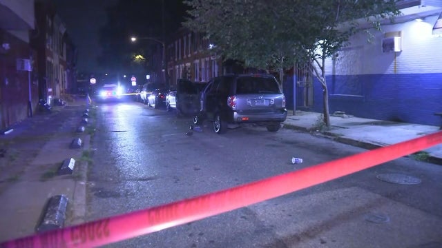 Police tape and lights are seen after a shooting in Philadelphia 