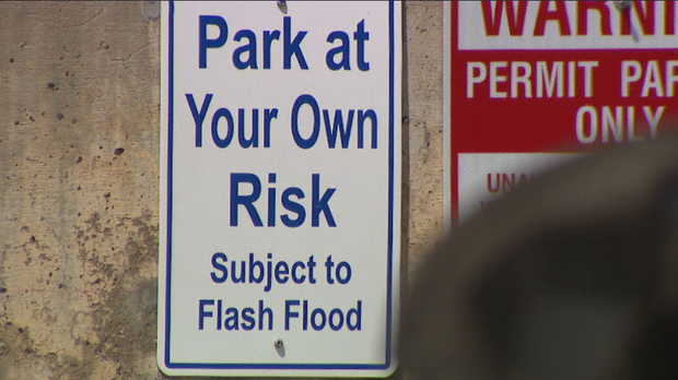park-at-own-risk-sign.png
