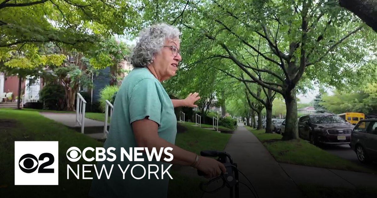 Queens homeowner says overgrown trees on her block are creating safety hazard at night