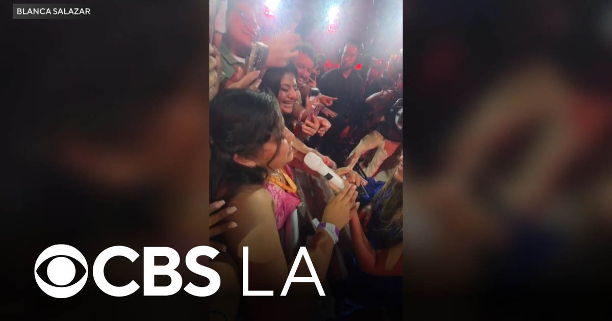 Santa Ana girl lives out dream by singing with Karol G during SoFi Stadium concert