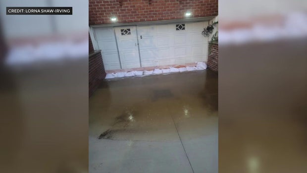 Floodwaters in driveway