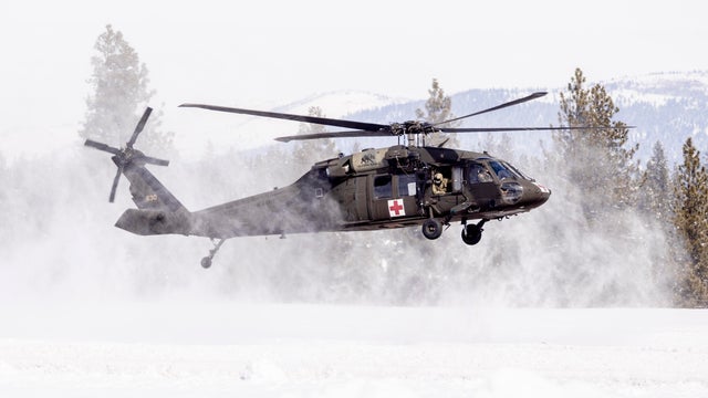 A rescue team departs to the site of an avalanche near Lake Tahoe 