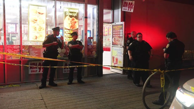 NYPD officers outside restaurant
