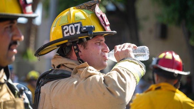 LAFD Resonds To Big Rig Car Carrier Crash Into Townhomes In Los Angeles 