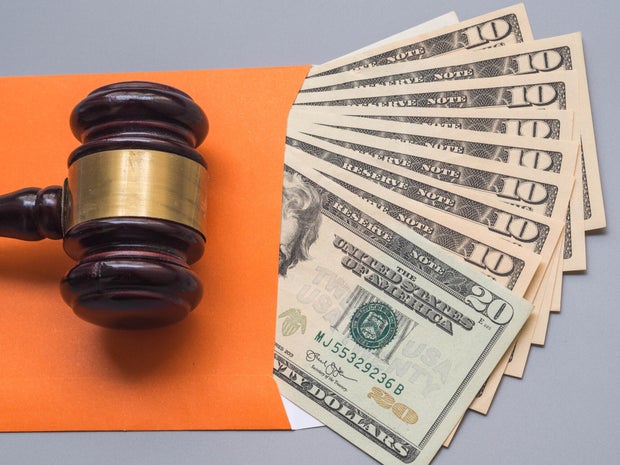 money legal Financial business concept wooden gavel with usa dollar close up