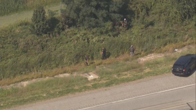 Generic police lights and yellow police tape at crime scene 
