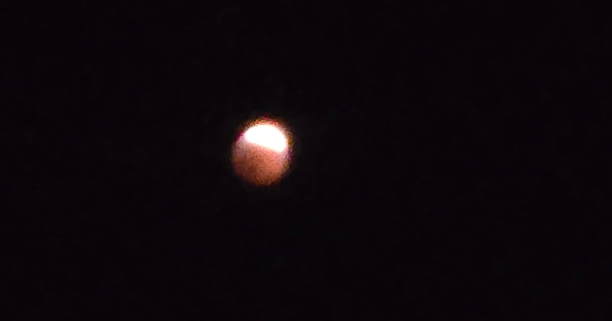 Photos show lunar eclipse in Pittsburgh turning moon red