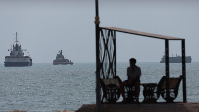 Vessels in the Strait of Hormuz are visible near the beach of Bandar Abbas 