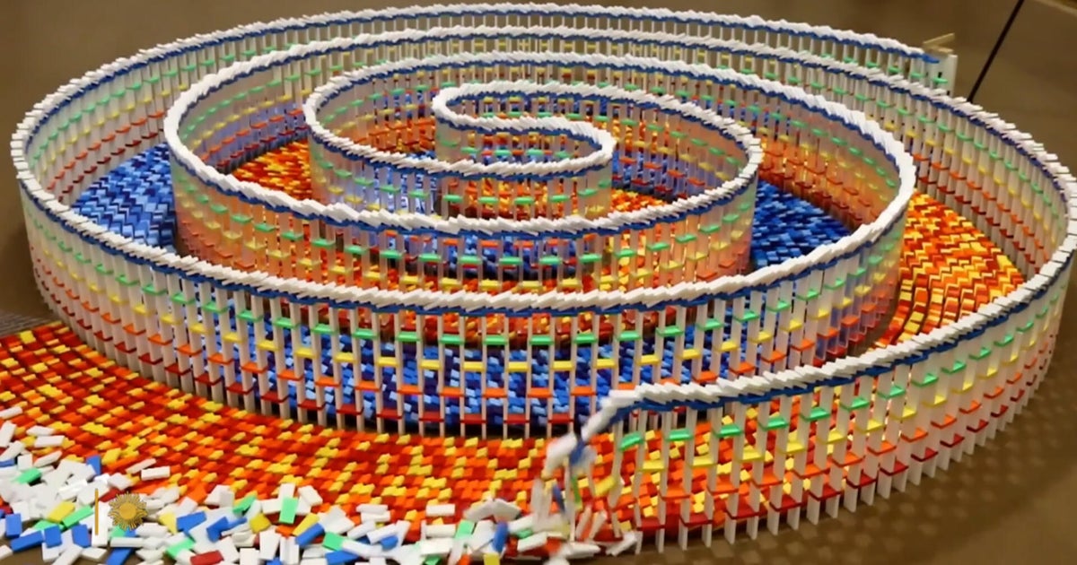 Toppling dominoes as art