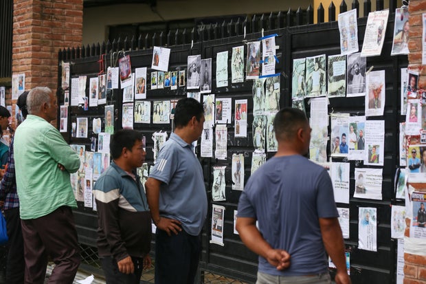 Families Search For Their Loved Ones Missing In Tibet-Nepal Floods