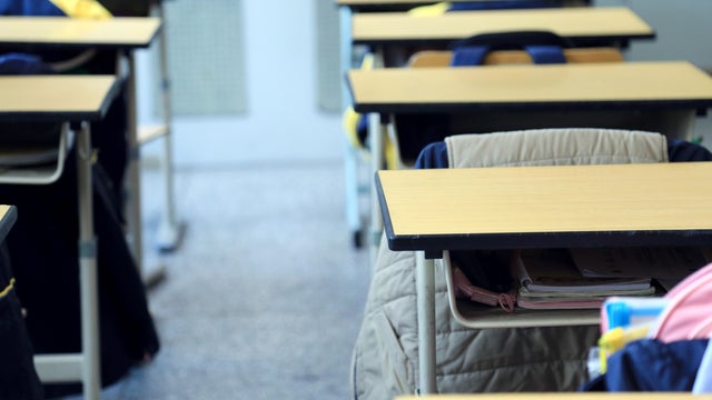 Close up of desks in the classroom. 