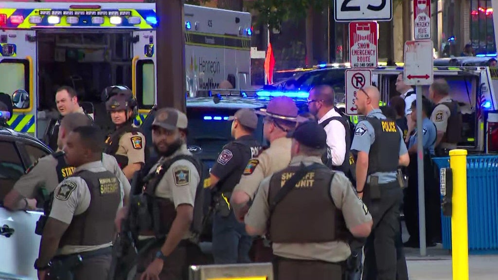 Coverage image for: 2 police officers shot in downtown Minneapolis; several others injured, city officials report