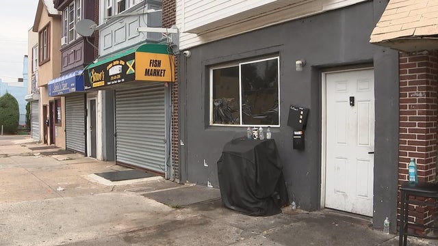 Exterior image of the illegal bar on Elmwood Avenue, the windows are blacked out 
