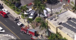1 dead, 3 injured after vehicle crashes into security stand at Mid-Wilshire parking lot
