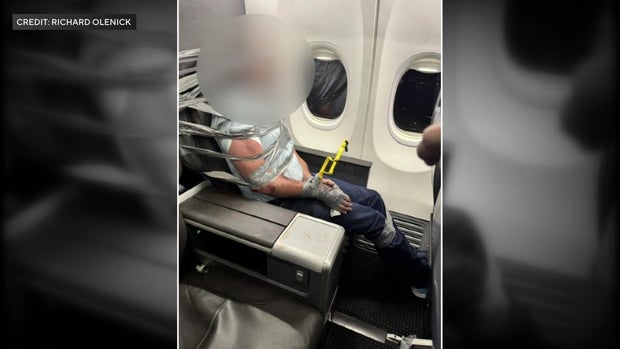 Man duct-taped to airplane seat