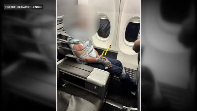 Man duct-taped to airplane seat 
