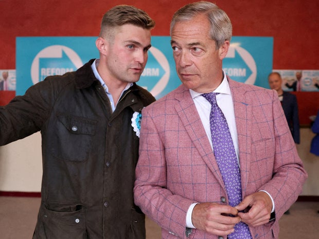 Dan Jukes speaks to Reform UK party leader Nigel Farage in Clacton-on-Sea, Britain, July 2, 2024.