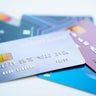 Credit cards stacked on white background 