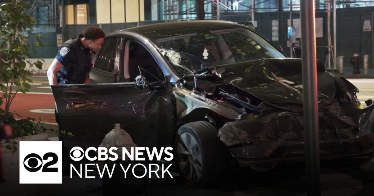 Woman dies after car drives through scaffolding in NYC, police say