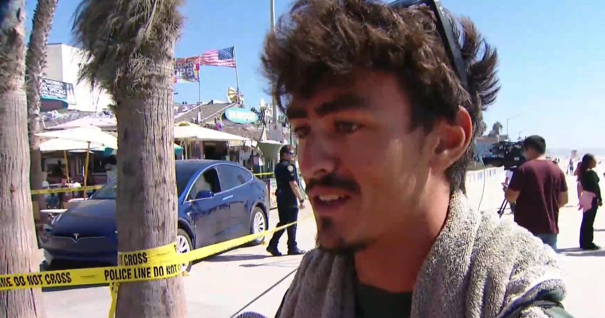 Smart glasses capture stolen Tesla barreling down San Diego boardwalk, man pinning down suspect