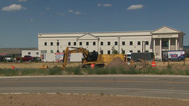 john-adams-academy-layoffs-10pkg-transfer-frame-2529.jpg