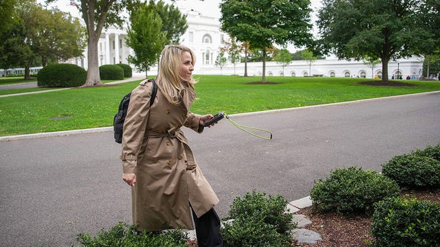 CNN senior reporter Betsy Klein walks to the press area on the North Lawn of the White House after being allowed back on the grounds on Sept. 24, 2026. 