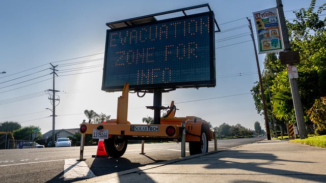 A fire broke out today in an outdoor battery storage unit at a Metropolitan Water District facility in La Verne, prompting evacuation orders and forcing crews into a defensive posture as flames rose from a building on the sprawling grounds. 