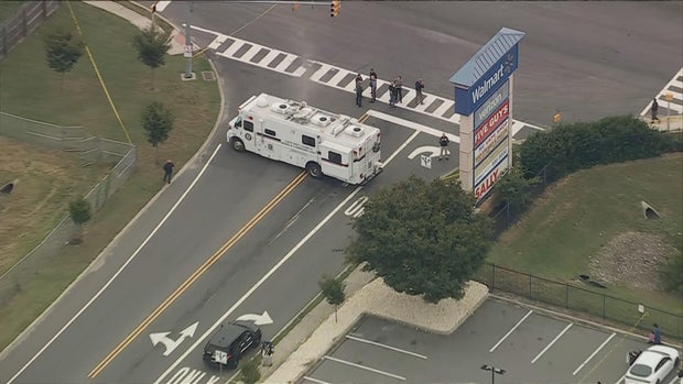 Overhead image of police in the street near a shopping center in Middle Township