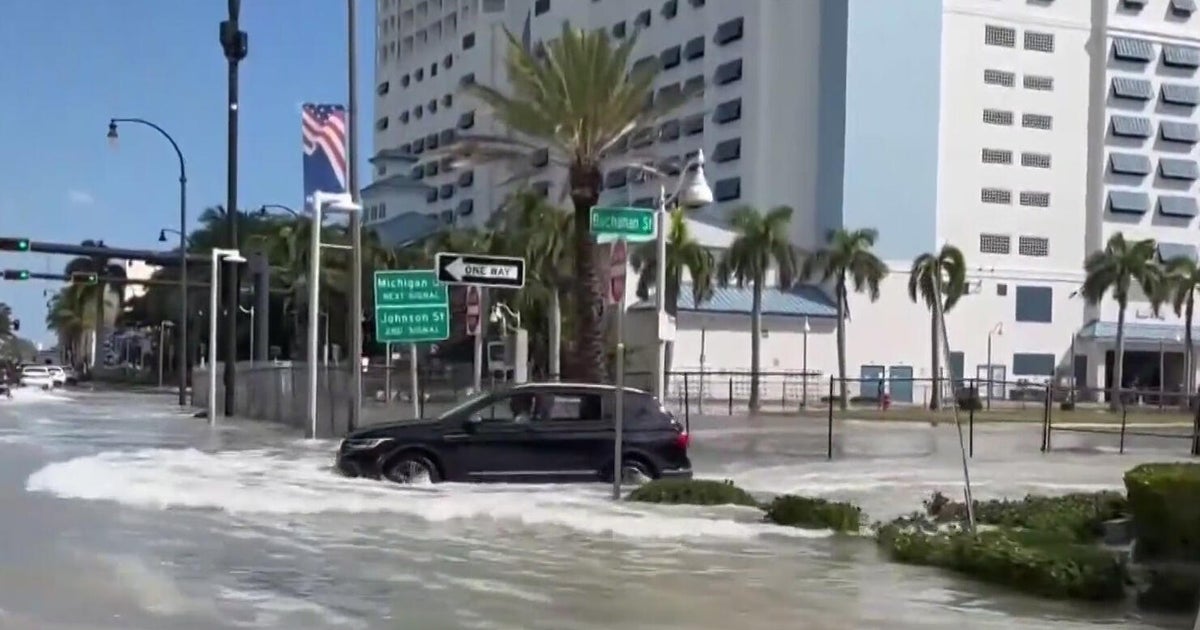 cbsnews.com - Morgan  Rynor - King tide flooding in South Florida puts residents on alert from Fort Lauderdale to Miami