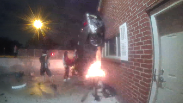 Driver rescued, car crashes into building, catches fire, Dallas 