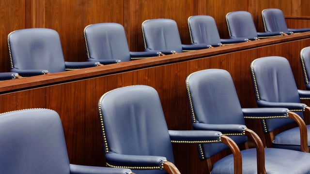 Empty Jury Seats in Courtroom 