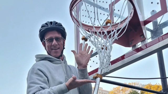 Man puts nets on local basketball hoops