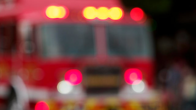 Fire Engine Blurred Out of Focus  Lights in Parade 