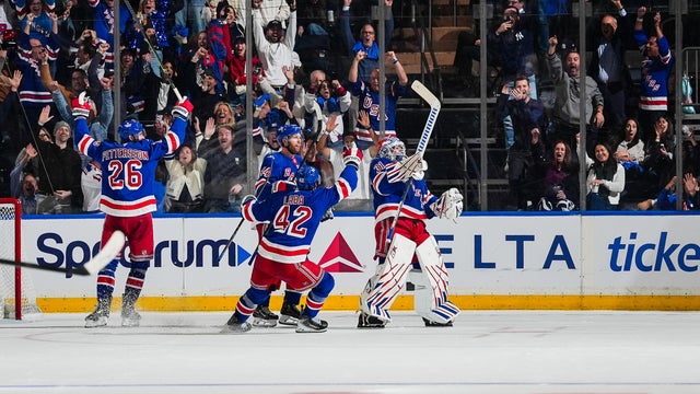 Igor Shesterkin #31 of the New York Rangers celebrates with teammates after scoring a goal during the third period against the Tampa Bay Lightning at Madison Square Garden on October 1, 2026 in New York City. 