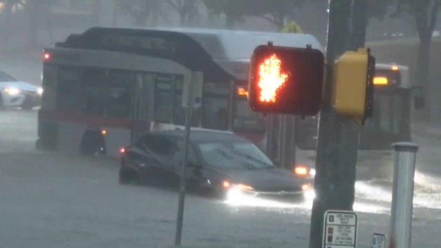 Roads submerged as floods sweep Texas