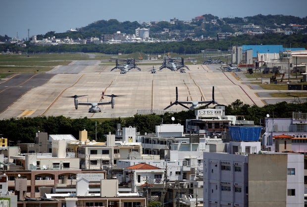 U.S. Marine arrested in Japan, accused of killing Japanese woman in Okinawa 3 FILE PHOTO: U.S. Marine Corps MV-22 Osprey aircrafts are seen at the U.S. Marine Corps' Futenma Air Station in Ginowan on Japan's southernmost island of Okinawa