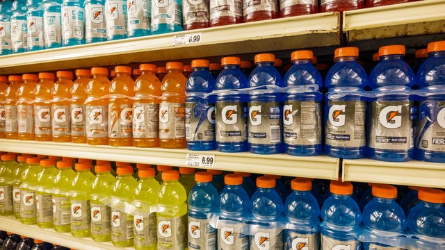 Shelves of sports drinks for sale in Winn Dixie. 