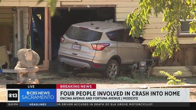 Police investigate after car crashes into Modesto home