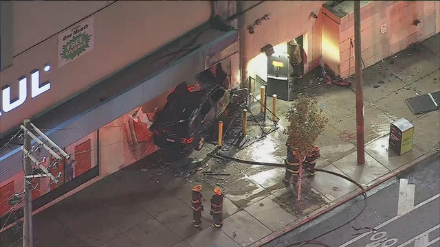 1 deaad after car crashes into U-Haul building in Kensington, sparking large fire 