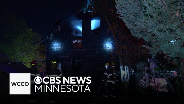 State trooper rescues 2 from Minneapolis house fire
