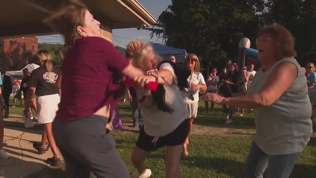 Elected official at center of fight at memorial event cited for harassment.