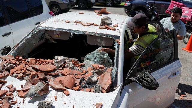 A car was damaged by falling debris after an earthquake in Panama City, Panama, Oct. 9, 2026. 