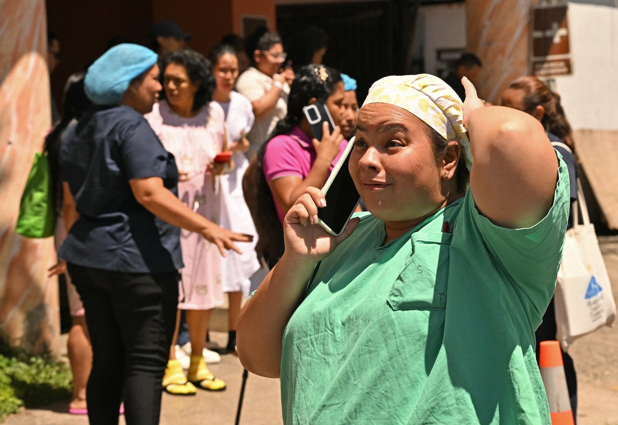 A nurse speaks on her cellphone outside the maternity ward of the Santo Tomas hospital, following an earthquake that hit Panama, in Panama City on Oct. 9, 2026.