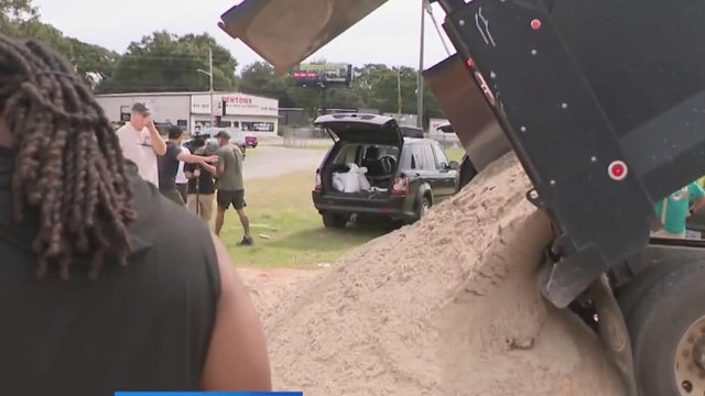 Florida Panhandle residents fill sandbags as Escambia County declares emergency for Hurricane Isaias