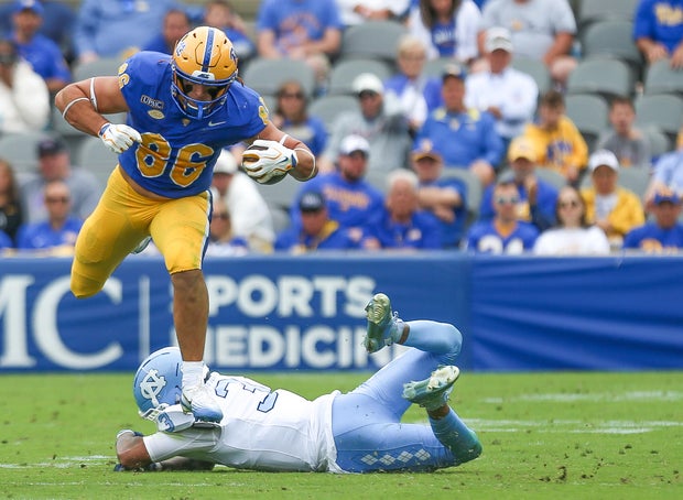 carson-kent-jumping-over-ade-willie.jpg