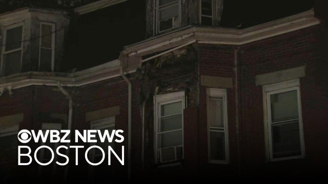 Part of apartment building collapses in Chelsea
