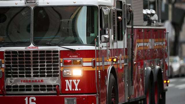 Firefighters and neighbors greet to healthcare workers in NYC 
